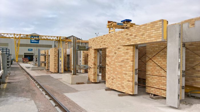 Precast concrete walls with brick facade