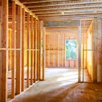 New house under construction framing against