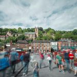 Crowd of Tourist Crossing Historic Bridge in Ironbridge