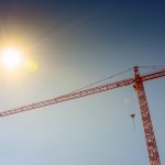 Industrial crane and sun