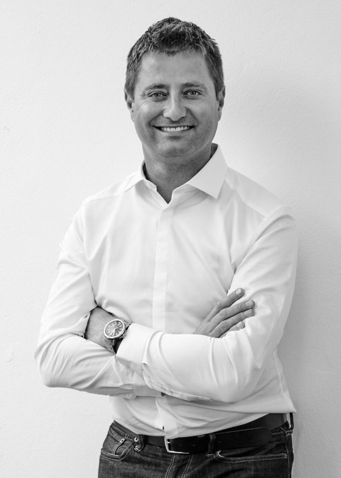 headshot of George Clarke