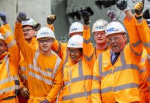 The team celebrates the historic tunnelling breakthrough