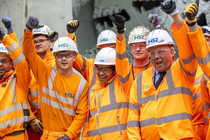The team celebrates the historic tunnelling breakthrough