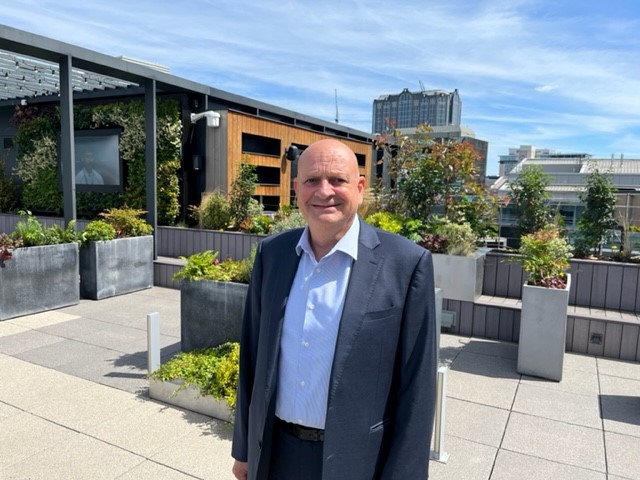 photo of Johnny Ojeil, head of transport planning at Ramboll, standing on roof top garden