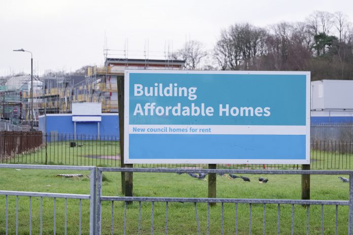 dreamstime_xxl_166652124 Sign for building affordable homes by local council to help governmentLevelling Up and Regeneration Bill for affordable housing