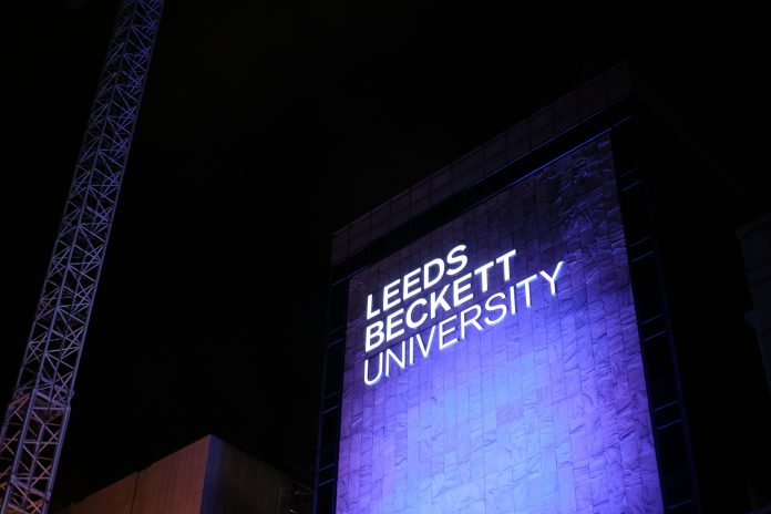 Leeds Beckett University lite up at night