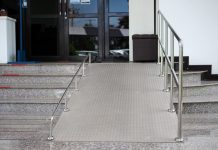 Accessibility: Is it the tenants or landlords responsibility? A ramp for disabled people going up and down outside a building