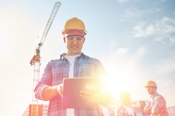 construction worker with tablet