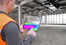 FARO releases Flatness Check AR app for concrete industry worker using FARO Flatness Check app on iPad