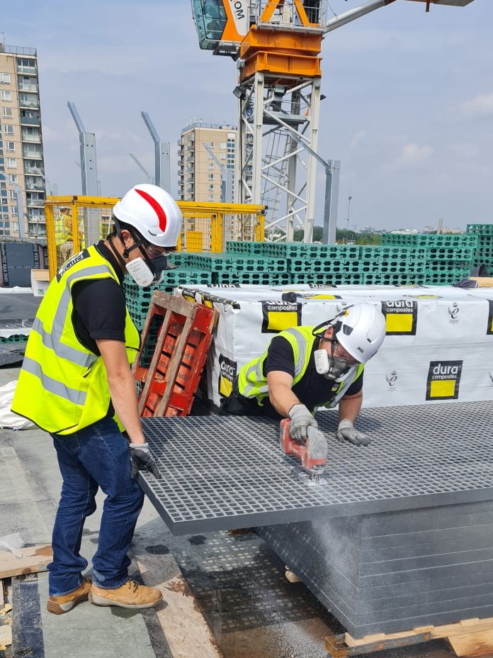 young people and women in construction Install Team on Site