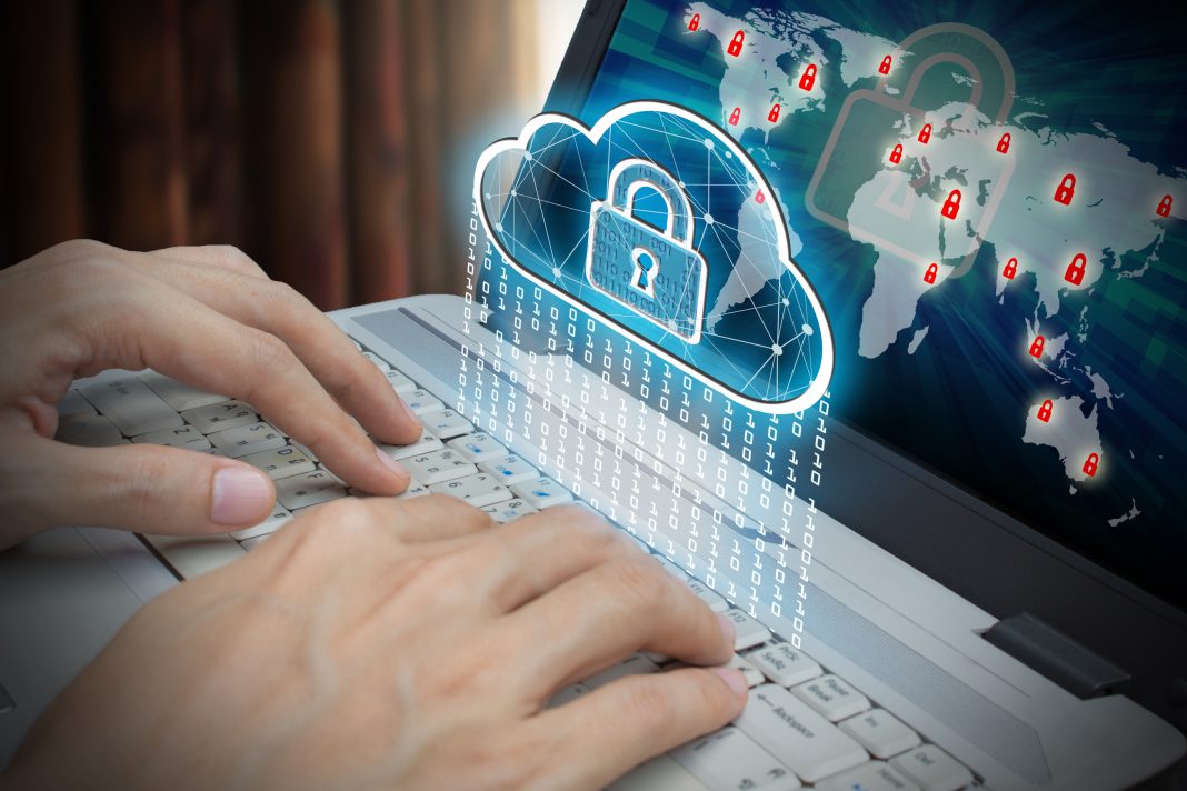 laptop with padlock and cloud computer technology to represent housebuilding specifications