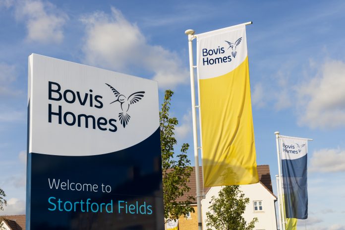 dreamstime_xxl_231908141 Bovis Homes (Vistry) sign and flags in the Stortford Fields housing development. Bishop`s Stortford, Hertfordshire