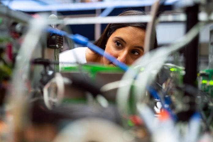 female engineer looking at data storage