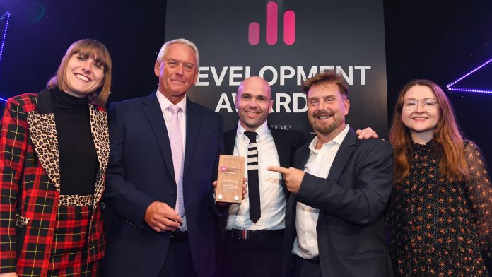The Beattie Passive team pictured at the Inside Housing Development awards, where two homeless housing projects in Wales from Beattie Passive have won industry awards for social value delivered and building performance