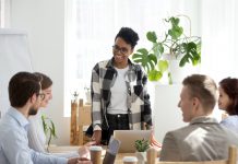 How improved accessibility can help to address staff shortages coach satisfied with office briefing having good relations and friendly conversation with workers