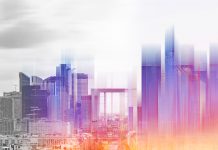 Digital construction for the built environment Black and white and rainbow colour skyline and high rise buildings to represent digital construction for the built environment