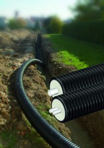 trench with pipes superimposed over the top.