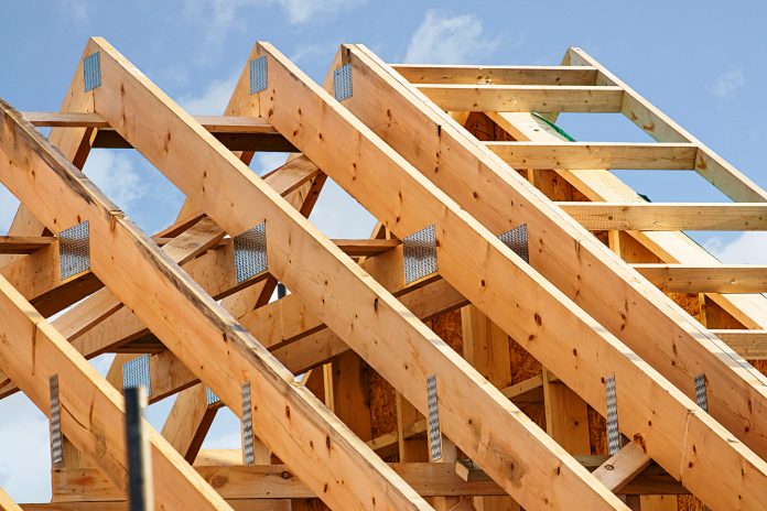 dreamstime_xxl_63326785 timber frame roof structure - sustainable supply chain construction homebuilding