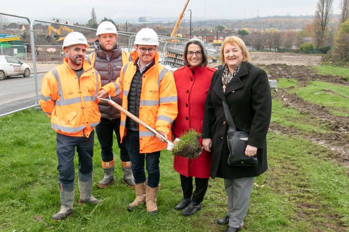 Keepmoat employees with Councillor Helen Hayden and Councillor Debra Coupar of Leeds City Council, celebrating the Leeds brownfield development