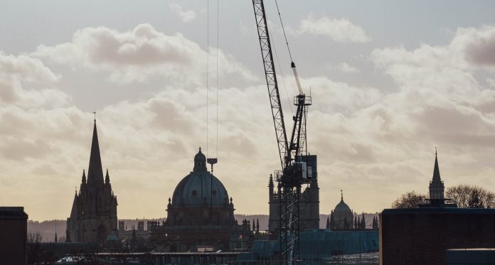 Thames Valley Police has selected Willmott Dixon to deliver a new Bicester forensics centre, as Wates' £200 life sciences building at the University of Oxford tops out