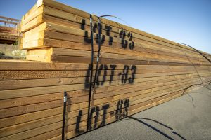 Lumber stacked at a housing construction site