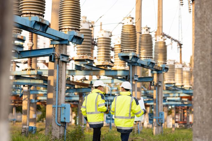 workers at a substation - Electricity substation