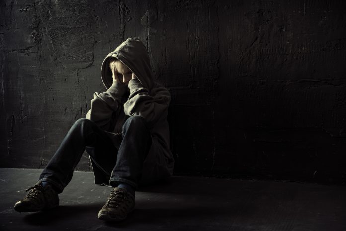 Taking a proactive approach to tackling modern slavery in the supply chain A lonely boy represents fighting modern slavery in the supply chain