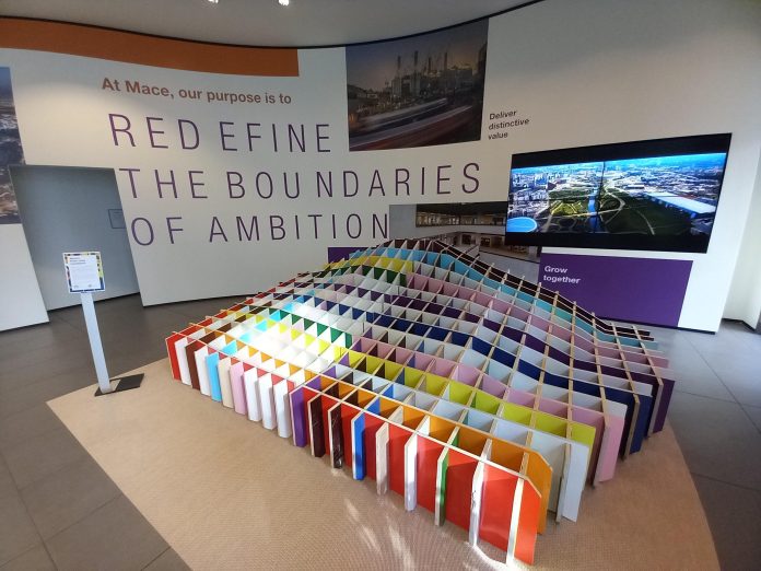 Mace Pride Unity Installation More than 40 bespoke wooden panels reclaimed from company sites were slotted together in a bench to mark Pride Month