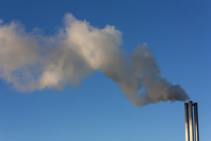 smoke coming from chimney - built environment emissions