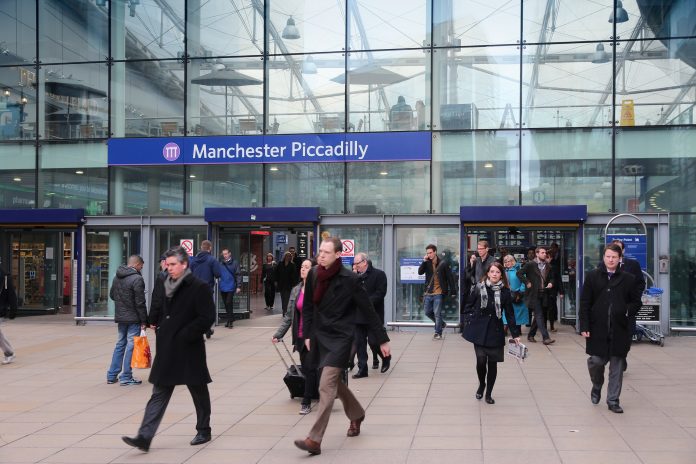 Travelers hurry at Piccadilly Station in Manchester, UK. More than 18 million passengers used the station in 2012.