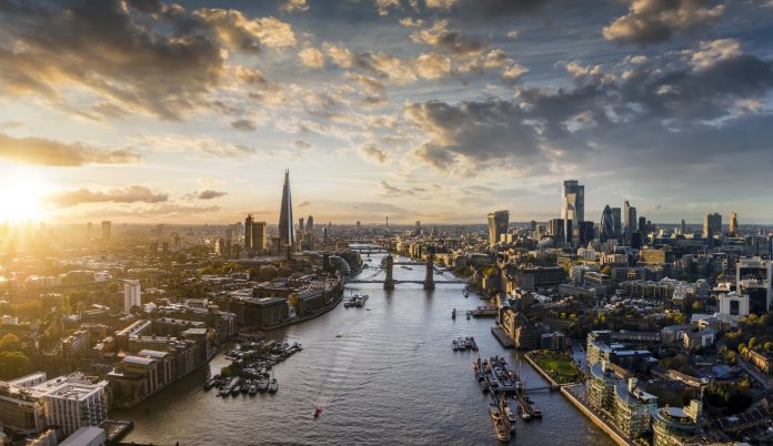 Thames Water has ‘significant issues’ to address, warns Ofwat Wide panoramic view to the modern skyline of London, United Kingdom, along the Thames river during sunset time