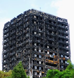 The burnt out remains of the 24-storey Grenfell Tower block in West London, which burnt down in the early hours of June 14th 2017 claiming the lives of around 100 people and making many more homeless. The fire, which was believed to have been caused by a faulty plug on a refrigerator, rapidly spread throughout the building due to the highly combustible nature of the exterior cladding of the tower block. The event was one of the worst losses of life caused by a domestic fire in the UK in living memory and was a national tragedy.