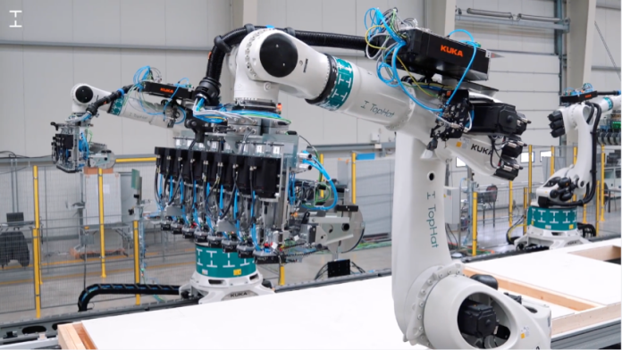 highly automated, modular housebuilding production line being tested at modular housebuilding factory
