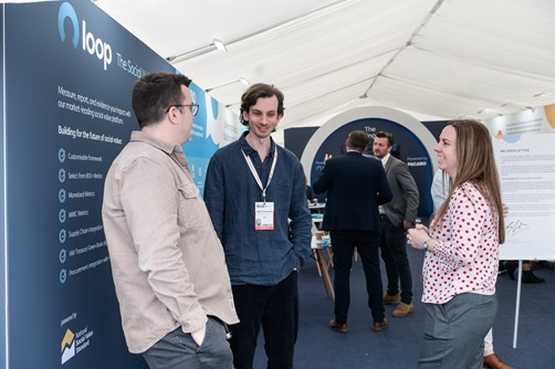 UKREiiF generates £2.25m in social value at built environment event Three people in conversation at UKREIIF event