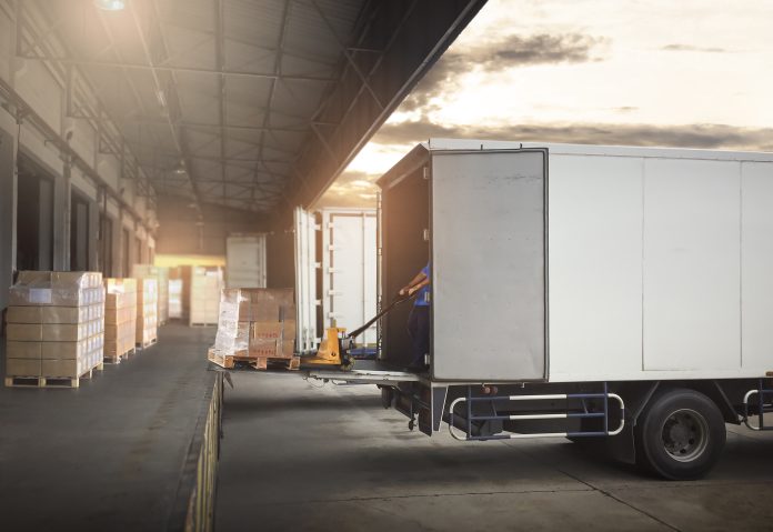 unloading cargo truck - urban logistics hub