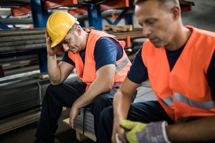 Administrations in the construction industry rise by 22% in 2023 Administrations in the construction industry - sad construction workers