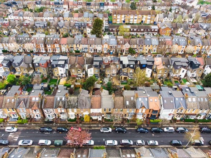 Does politics hold the key to solving the housing crisis? Aerial view, taken by drone, depicting the row houses and residential streets of Walthamstow in east London, UK.