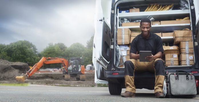 CITB pilots safer plant training and grant changes A Service engineer sat on the back step of his van using a digital tablet, representing safer plant training