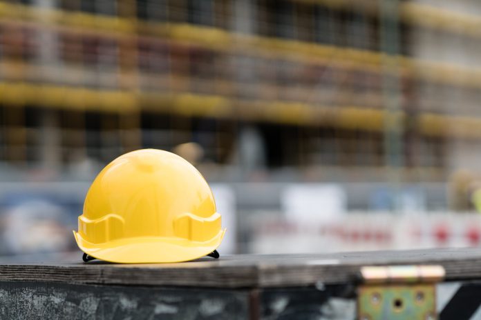 M-AR shortlisted for four Offsite Awards Yellow safety hardhat. Front view