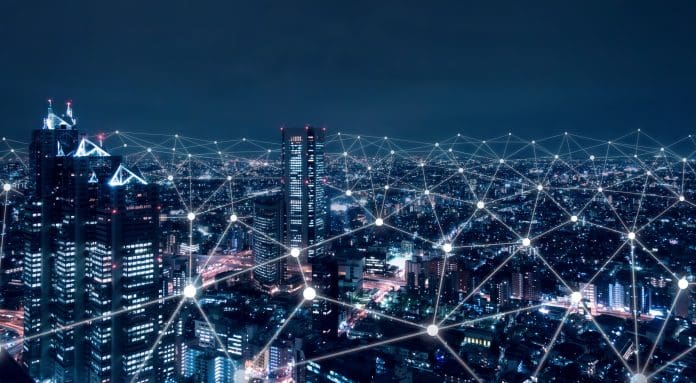 Cyber-physical infrastructure: Towards a more digital built environment Telecommunication network above city, wireless mobile internet technology for smart grid or 5G LTE data connection, concept about IoT, global business, fintech, blockchain