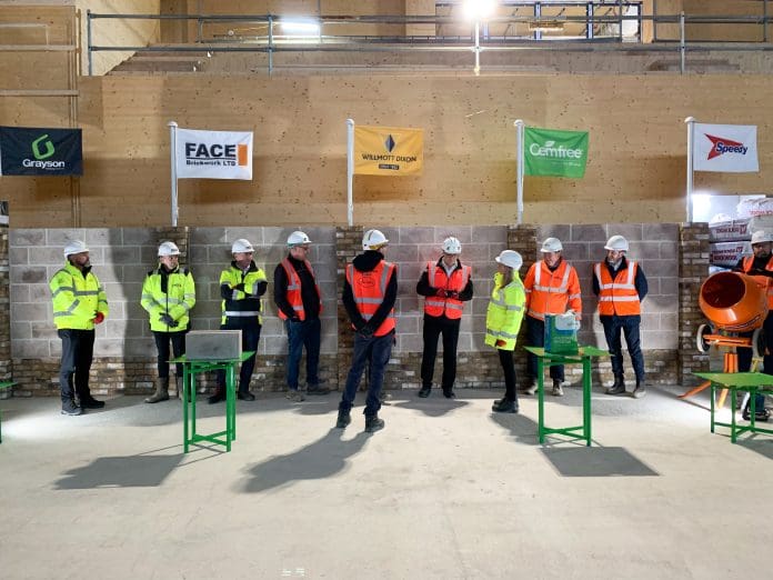 Willmott Dixon, FACE Brickwork and others have joined forces to highlight eco-friendly building materials with a demonstration wall