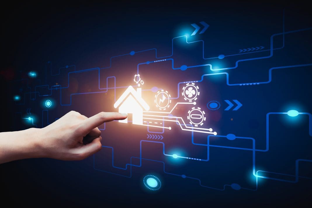 The finger presses the command to the smart house, Smart home automation control system.