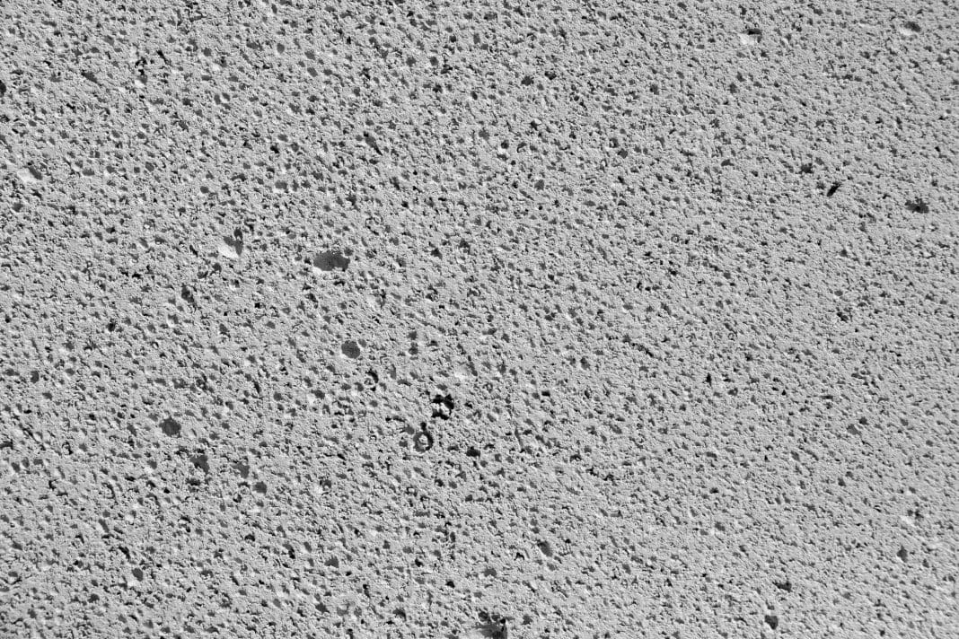 Autoclaved aerated concrete. Gray background close up texture Autoclaved aerated concrete. Gray background close up texture