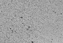 Permission given for temporary RAAC classrooms to stay for up to 2 years Autoclaved aerated concrete. Gray background close up texture