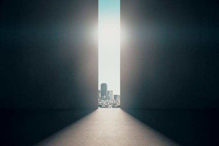 Construction sector sees 4% rise in project starts during Q4 2023 Abstract opening in wall with bright daylight and city view in concrete interior. Success concept. 3D Renderingm representing project starts