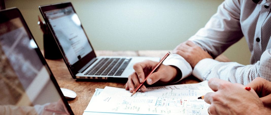 marking your own homework_banner man sat at desk, planning policy and reform