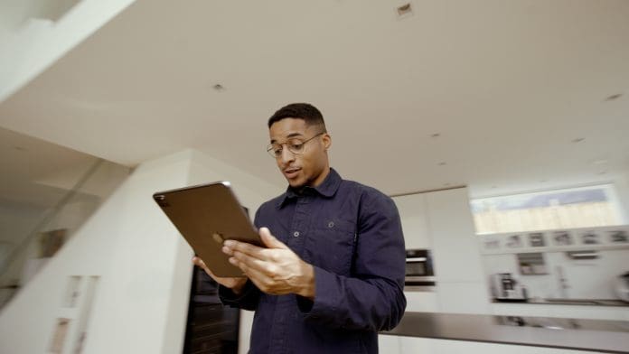 Man holding tablet