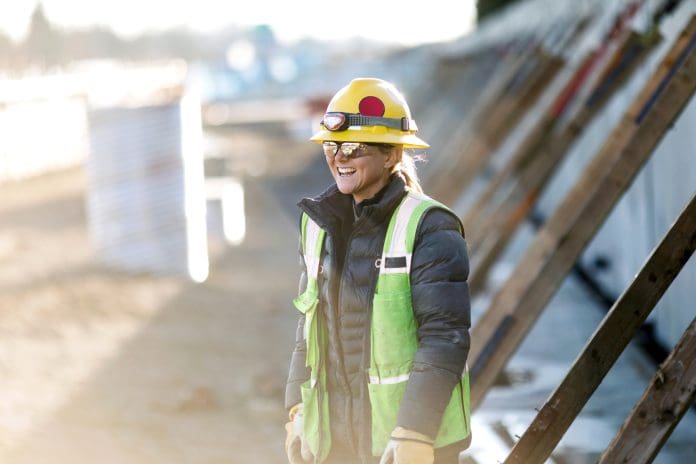 NG Bailey opens applications for construction apprenticeship scheme A female Caucasian laborer works on a large scale light-rail project in Washington state. A well paying trade job for a needed skillset.