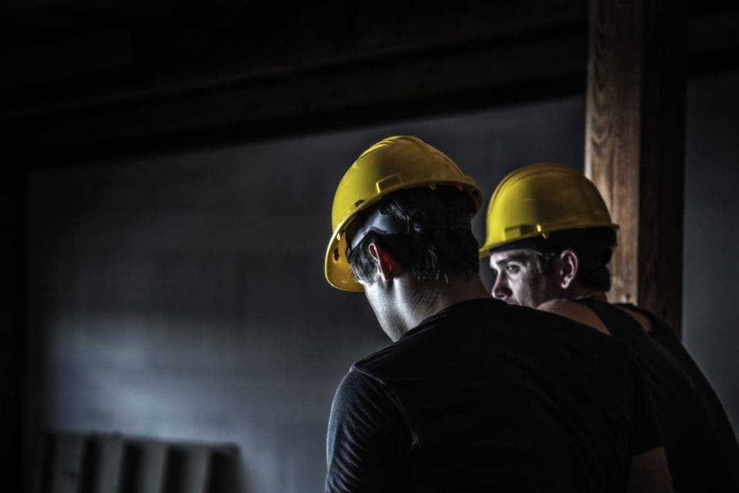 Night Shift Construction Workers Talking During Rest Break Construction output in Q4 2023 reflected the ONS's news of a confirmed recession, as both quarterly and monthly output decreased