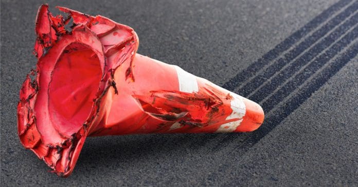 Image of traffic cone on its side